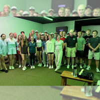 CMU alumni with golf team