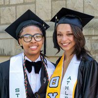 CMU graduates smiling